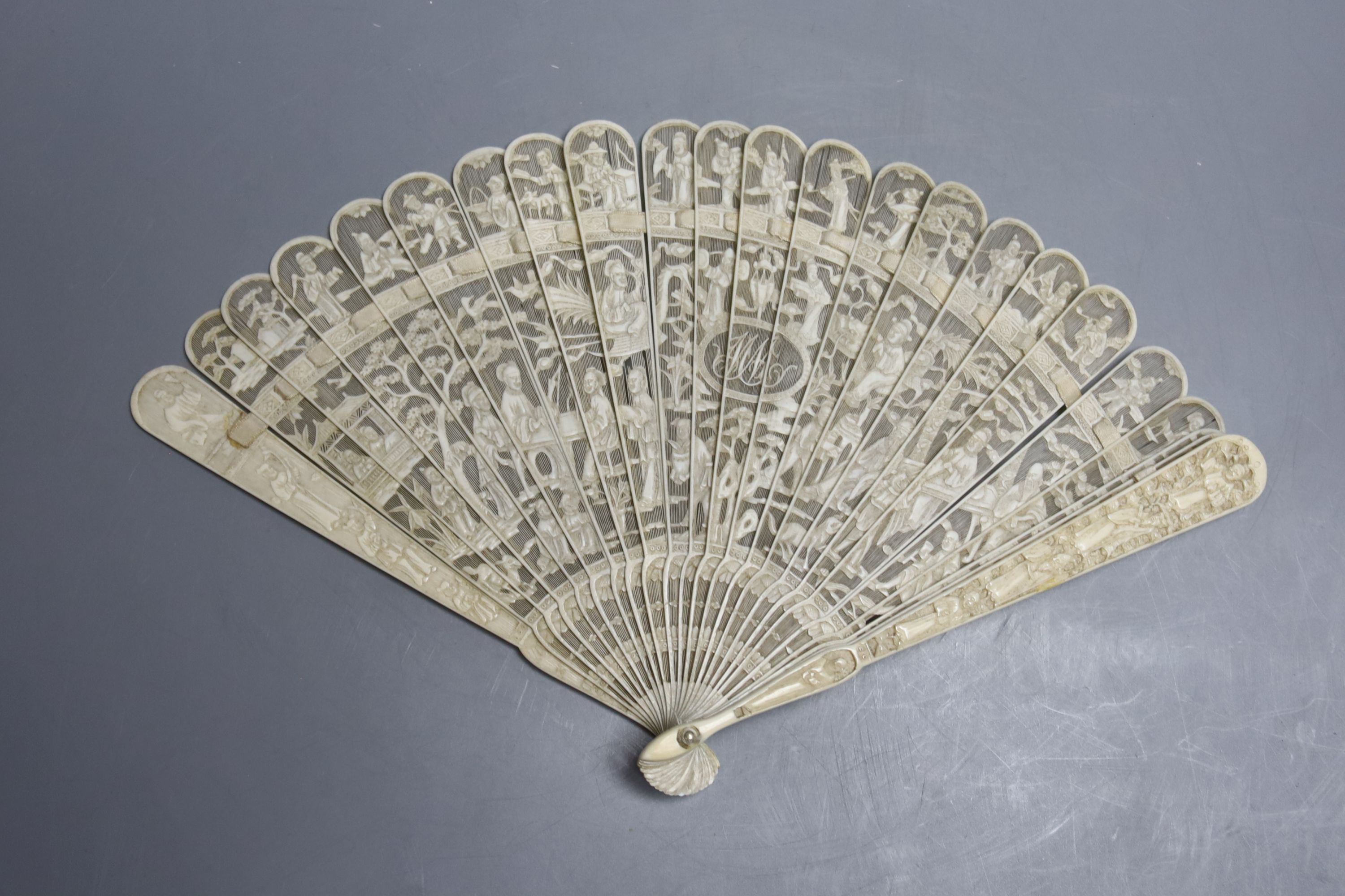 A 19th century Cantonese ivory fan, overall length opened 32cm (a.f.)